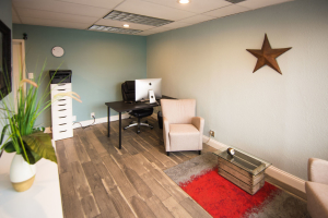 New wall colors, flooring, LED Can lighting and furniture: an inviting office.